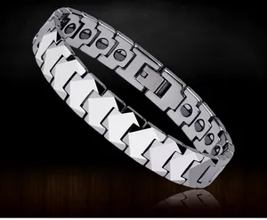 Detailed close-up of stainless steel bracelet showing magnetic inserts and V-shaped links