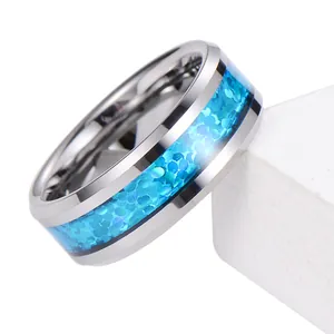 Sleek silver tungsten steel ring for men with vibrant blue opal inlay on a white pedestal