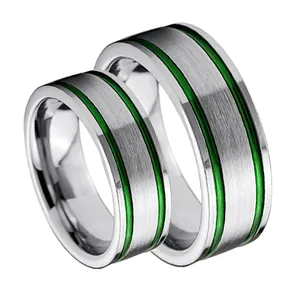 Brushed tungsten steel ring set with vibrant green inlay and silver matte finish