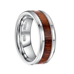 Men's tungsten carbide ring with wood inlay and polished silver edges on white background
