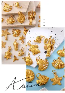 Detail of golden sea life charms including starfish and seahorse with pearl accents