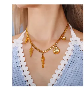 Gold ocean charms necklace with sea fish shell and pearl pendants on chunky chain