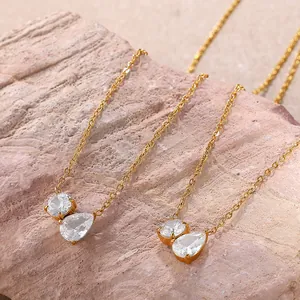 18K gold plated stainless steel necklace with round and pear cut crystal pendants