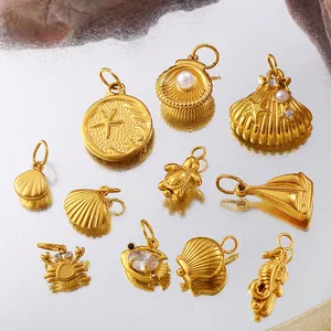 Golden stainless steel ocean pendants with starfish and pearls on a water drop background