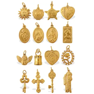 Set of 16 vintage style gold-plated pendants featuring sun, heart and star designs