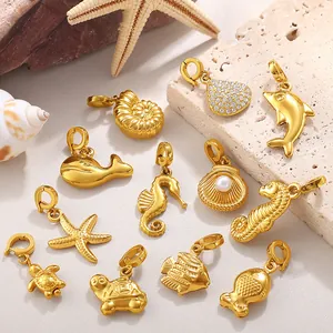 18K gold plated ocean charm set featuring dolphin starfish and turtle with pearls