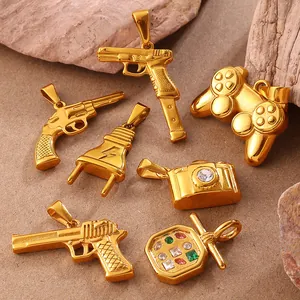 7-piece vintage gold charm set featuring camera, gamepad, and gun designs for jewelry DIY