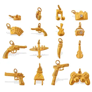 Gold vintage charms set featuring camera, musical instruments and grenade for DIY jewelry