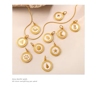 Detailed view of 18K gold serpent chain necklace with ten white enamel circular pendants