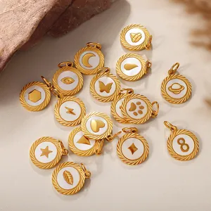 Collection of golden round pendants with white shell inlay and various embossed patterns