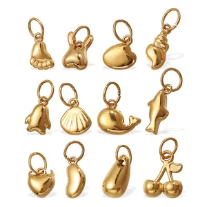 Set of 12 gold stainless steel pendants featuring animal and geometric shapes on white background