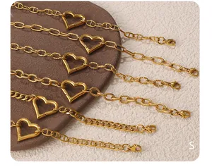 Detail of 18k gold plated hollow heart clasps and various chain styles for bracelets