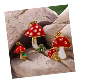 Macro view of colorful enamel mushroom pendants with golden rings for DIY jewelry