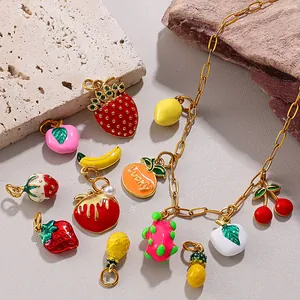 Colorful enamel fruit pendants including strawberry and lemon on a gold link necklace