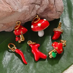 DIY vegetable pendants set with red mushrooms and chili charms in gold finish