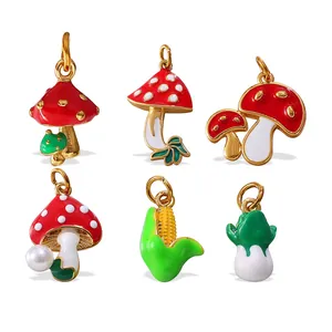 Vibrant enamel vegetable charms including mushroom, corn and cabbage with gold metal edges