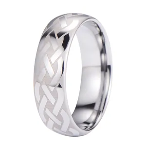 Polished silver tungsten ring featuring a laser Celtic knot pattern on a matte background