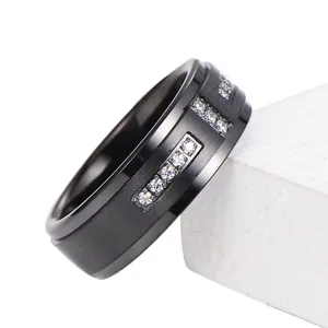 Men's black tungsten ring with brushed matte finish and three groups of round diamonds