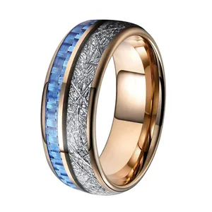 Rose gold tungsten ring with blue carbon fiber and silver meteorite texture inlay