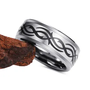 8mm black tungsten ring with tribal pattern on wood background for men