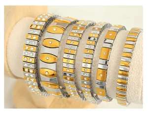 Detailed shot of two-tone stretch bracelets with rhinestones on a jewelry stand