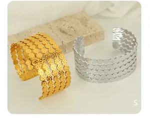 Detail of 18K gold and silver plated hammered texture cuffs with five-row round discs