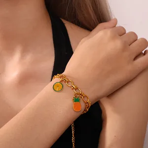 Gold chain bracelet with colorful pineapple and lemon fruit enamel pendants for summer