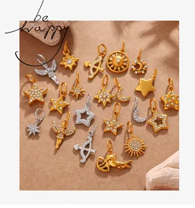 Detailed collection of celestial pendants featuring gold stars, moons, and angels with zircon