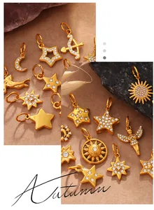 Detailed close-up of gold star and moon charms with sparkling crystal embellishments