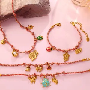 Handcrafted colorful cord jewelry set with gold enamel insect and flower pendants