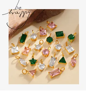 Close-up of geometric zirconia pendants in heart and star shapes with gold plated bases