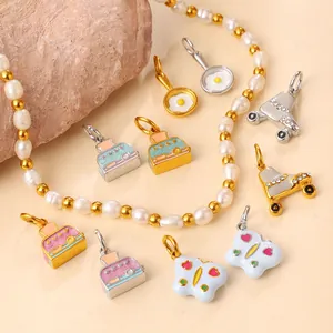 Colorful enamel charms set featuring fried egg pan, toaster, and butterfly designs
