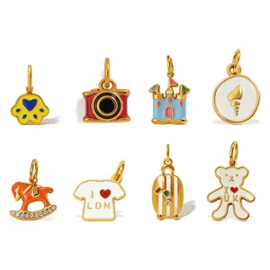 Set of 8 colorful enamel charms featuring bear, camera, and castle for bag decoration