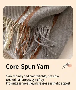 Detail of soft core-spun yarn texture on striped scarf with decorative fringe finish