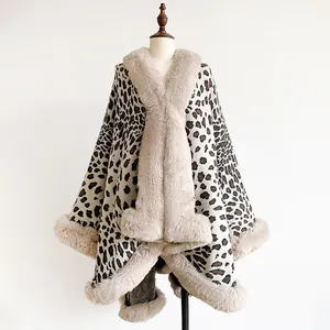Detail of leopard print shawl with plush faux rabbit fur collar and knit texture finish