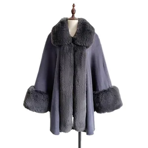 Luxurious gray-blue faux fur collar poncho coat for women in autumn winter season