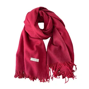Classic deep red 100% wool scarf with fringe tassels for winter warmth and style