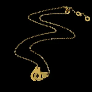 Polished rose gold handcuff link necklace with adjustable cable chain on black background