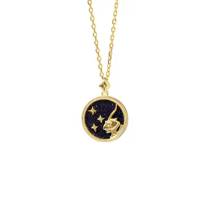 Macro view of gold S925 silver Capricorn necklace with blue starry shell and bead border