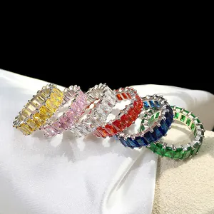 Set of six rainbow eternity bands with emerald cut zircon stones in silver finish