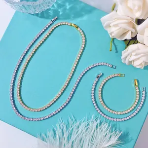 Detail of gold and silver tennis necklace and bracelet sets with 4mm cubic zirconia stones
