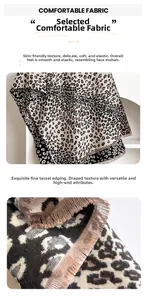 Détail de l'écharpe jacquard léopard avec texture douce en cachemire et bordures à franges