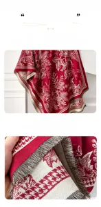 Detailed view of red floral cashmere scarf featuring delicate twisted fringe edges