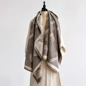 Detailed view of the soft geometric pattern and fringe edges on the winter pashmina shawl