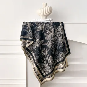 Detail of tropical plant jacquard cashmere shawl with houndstooth edge and fine fringe