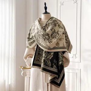 Detail of tropical plant and houndstooth jacquard cashmere scarf with tassel edges
