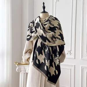 Classic black and white houndstooth scarf with star pattern and elegant tassels