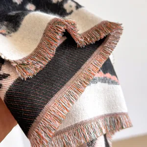 Ethnic cashmere-feel shawl with paisley pattern and colorful tassels for winter warmth