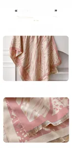Close-up of pink leopard zebra print scarf with premium fringe tassels and soft texture
