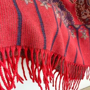 Elegant red paisley cashmere poncho with thick fringe tassels for winter warmth
